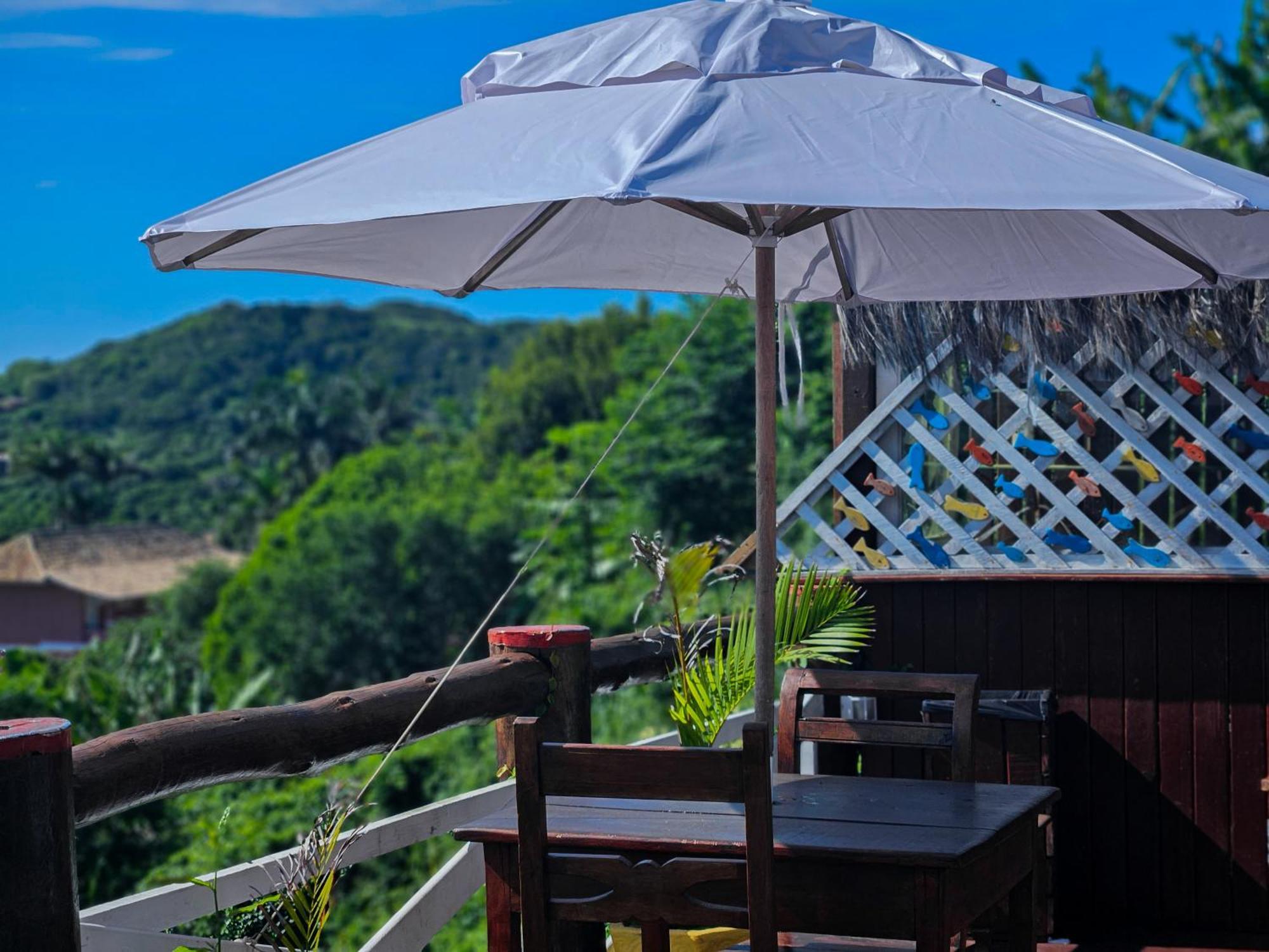 Отель Bella Vista Ocean View Armacao dos Buzios Экстерьер фото A patio umbrella