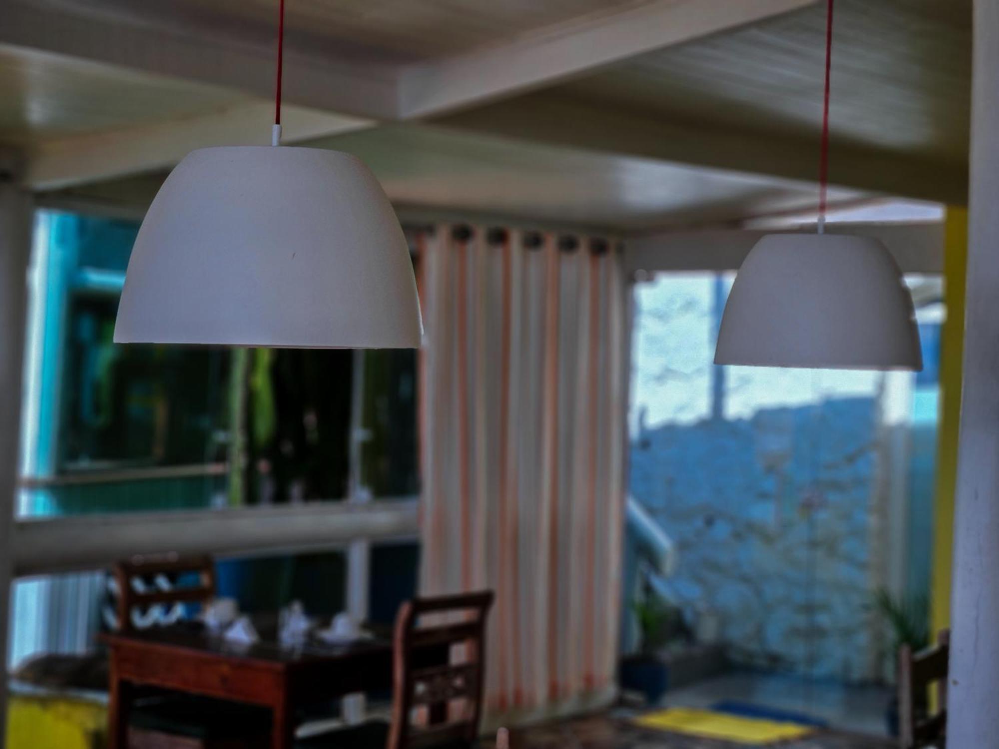 Отель Bella Vista Ocean View Armacao dos Buzios Экстерьер фото A pair of pendant lights